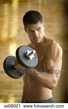 Stock Photography - bare-chested man 
lifting dumbbell 
indoors. fotosearch 
- search stock 
photos, pictures, 
images, and photo 
clipart
