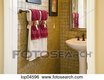 Stock Photo - bathroom with 
red towels and 
pedestal sink. 
fotosearch - search 
stock photos, 
pictures, images, 
and photo clipart