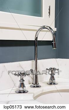 Stock Photo - bathroom vanity 
and faucet. fotosearch 
- search stock 
photos, pictures, 
images, and photo 
clipart
