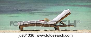 Stock Photo - beach chair on 
beach. fotosearch 
- search stock 
photos, pictures, 
images, and photo 
clipart