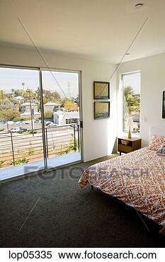 Stock Image - bedroom with balcony. 
fotosearch - search 
stock photos, 
pictures, images, 
and photo clipart