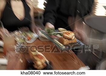 Stock Photography - blurred view of 
food being served 
at restaurant. 
fotosearch - search 
stock photos, 
pictures, images, 
and photo clipart