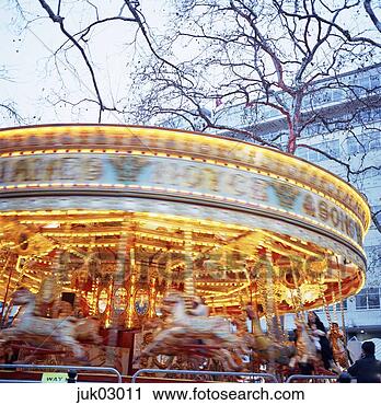 Stock Photography - blurry fairground 
carousel. fotosearch 
- search stock 
photos, pictures, 
images, and photo 
clipart