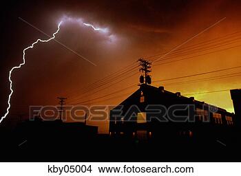Stock Photo - bolt of lightning 
over warehouse. 
fotosearch - search 
stock photos, 
pictures, images, 
and photo clipart