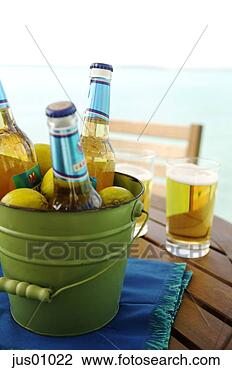 Stock Photo - bottles of beer 
in bucket. fotosearch 
- search stock 
photos, pictures, 
images, and photo 
clipart