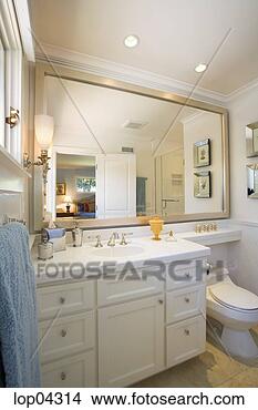Stock Photo - bright cozy bathroom 
with large mirror. 
fotosearch - search 
stock photos, 
pictures, images, 
and photo clipart
