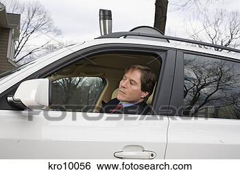 Stock Photo - businessman driving 
to work. fotosearch 
- search stock 
photos, pictures, 
images, and photo 
clipart