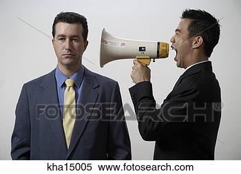 Stock Image - businessman screaming 
at co-worker with 
megaphone. fotosearch 
- search stock 
photos, pictures, 
images, and photo 
clipart