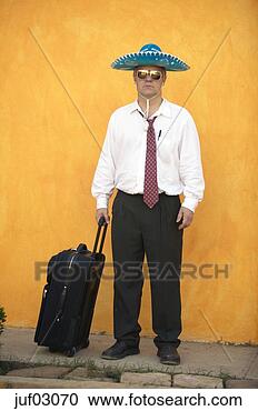 Stock Photography - businessman wearing 
sunglasses and 
sombrero with 
suitcase. fotosearch 
- search stock 
photos, pictures, 
images, and photo 
clipart