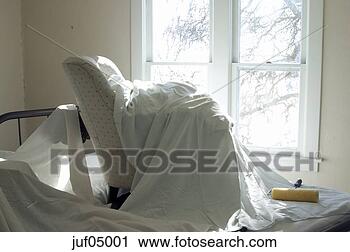 Stock Photography - chair underneath 
sheet. fotosearch 
- search stock 
photos, pictures, 
images, and photo 
clipart
