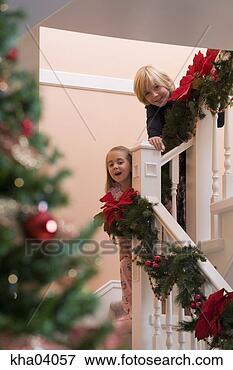 Picture - children eagerly 
awaiting christmas 
day. fotosearch 
- search stock 
photos, pictures, 
images, and photo 
clipart