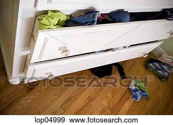 Stock Photograph - childs overflowing 
dresser. fotosearch 
- search stock 
photos, pictures, 
images, and photo 
clipart