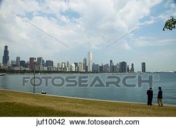Stock Photo - city skyline viewed 
across water. 
fotosearch - search 
stock photos, 
pictures, images, 
and photo clipart