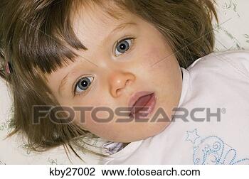 Stock Photo - close up of young 
girl's face. fotosearch 
- search stock 
photos, pictures, 
images, and photo 
clipart