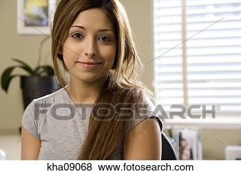 Stock Photo - close up of young 
woman wearing 
t-shirt with hair 
in ponytail. fotosearch 
- search stock 
photos, pictures, 
images, and photo 
clipart