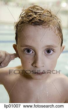 Picture - close up of young 
boy with wet hair. 
fotosearch - search 
stock photos, 
pictures, images, 
and photo clipart