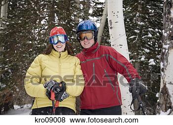 Stock Photo - couple cross-country 
skiing. fotosearch 
- search stock 
photos, pictures, 
images, and photo 
clipart