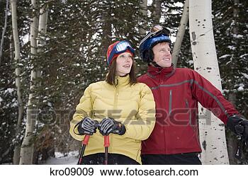 Stock Photograph - couple cross-country 
skiing. fotosearch 
- search stock 
photos, pictures, 
images, and photo 
clipart