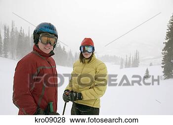 Stock Photo - couple cross-country 
skiing. fotosearch 
- search stock 
photos, pictures, 
images, and photo 
clipart