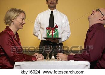 Stock Photo - couple enjoying 
dinner at restaurant. 
fotosearch - search 
stock photos, 
pictures, images, 
and photo clipart
