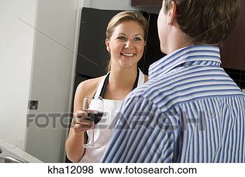 Stock Photo - couple enjoying 
wine. fotosearch 
- search stock 
photos, pictures, 
images, and photo 
clipart