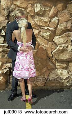 Stock Photo - couple in formal 
dress kissing 
outside house. 
fotosearch - search 
stock photos, 
pictures, images, 
and photo clipart