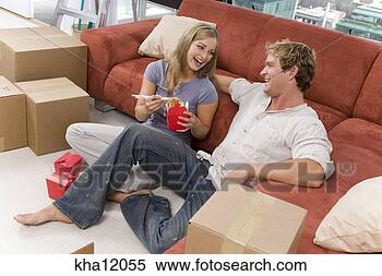 Stock Image - couple sharing 
chinese food. 
fotosearch - search 
stock photos, 
pictures, images, 
and photo clipart