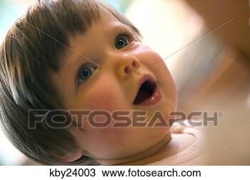Stock Photo - curious baby girl. 
fotosearch - search 
stock photos, 
pictures, images, 
and photo clipart