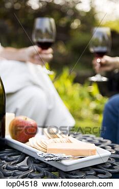 Stock Photo - detail of people 
with wine glasses 
and cheese. fotosearch 
- search stock 
photos, pictures, 
images, and photo 
clipart