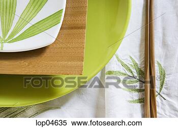 Stock Image - detail of place 
setting with green 
leaves. fotosearch 
- search stock 
photos, pictures, 
images, and photo 
clipart
