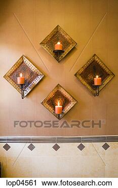Stock Photography - diamond shaped 
candle holders 
on wall. fotosearch 
- search stock 
photos, pictures, 
images, and photo 
clipart