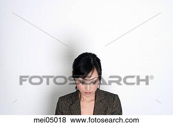 Stock Photo - disappointed asian 
woman. fotosearch 
- search stock 
photos, pictures, 
images, and photo 
clipart