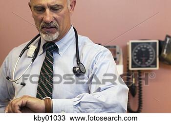 Stock Photo - doctor checking 
watch. fotosearch 
- search stock 
photos, pictures, 
images, and photo 
clipart