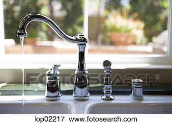 Picture - dripping faucet. 
fotosearch - search 
stock photos, 
pictures, images, 
and photo clipart
