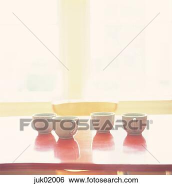 Stock Photo - empty coffee cups 
on table. fotosearch 
- search stock 
photos, pictures, 
images, and photo 
clipart