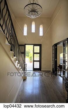 Stock Photo - entryway with 
chandelier and 
staircase. fotosearch 
- search stock 
photos, pictures, 
images, and photo 
clipart