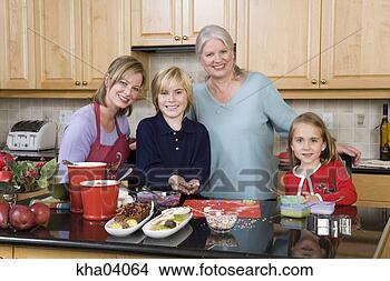 Stock Photo - family making 
christmas cookies. 
fotosearch - search 
stock photos, 
pictures, images, 
and photo clipart