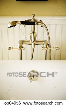 Stock Photo - fancy bathtub 
faucet and shower 
head. fotosearch 
- search stock 
photos, pictures, 
images, and photo 
clipart