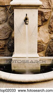 Stock Photo - faucet emptying 
into water fountain. 
fotosearch - search 
stock photos, 
pictures, images, 
and photo clipart