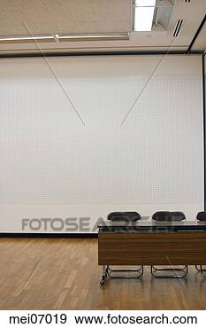 Stock Photograph - folding table 
and chairs in 
empty room. fotosearch 
- search stock 
photos, pictures, 
images, and photo 
clipart