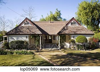 Stock Photograph - front exterior 
of country style 
home. fotosearch 
- search stock 
photos, pictures, 
images, and photo 
clipart