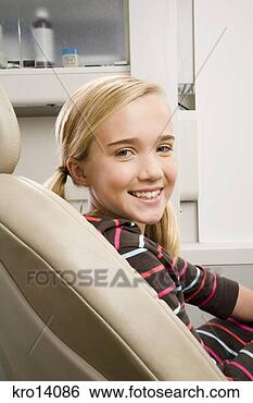 Stock Photo - girl sitting in 
dental chair. 
fotosearch - search 
stock photos, 
pictures, images, 
and photo clipart