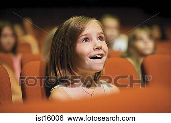 Stock Photo - girl sitting in 
theatre seat. 
fotosearch - search 
stock photos, 
pictures, images, 
and photo clipart