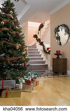 Stock Photo - home and christmas 
tree decorated 
for holidays. 
fotosearch - search 
stock photos, 
pictures, images, 
and photo clipart