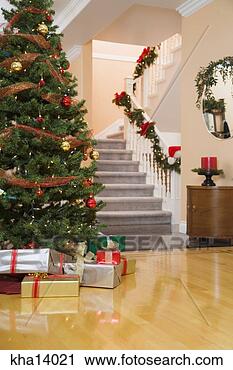 Stock Photography - home and christmas 
tree decorated 
for the holidays. 
fotosearch - search 
stock photos, 
pictures, images, 
and photo clipart