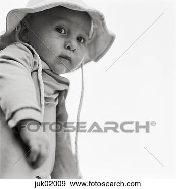 Stock Photograph - infant in bonnet. 
fotosearch - search 
stock photos, 
pictures, images, 
and photo clipart