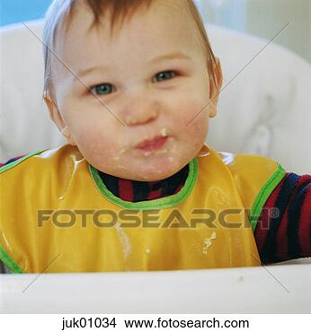 Stock Photo - infant with food 
on it's face. 
fotosearch - search 
stock photos, 
pictures, images, 
and photo clipart
