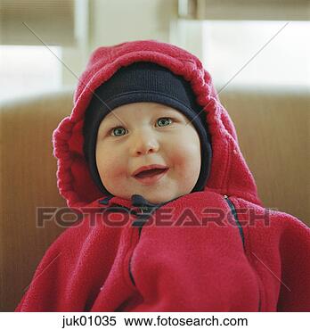 Stock Image - infant wrapped 
up in fleece. 
fotosearch - search 
stock photos, 
pictures, images, 
and photo clipart