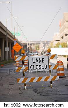 Stock Photo - lane closed barricade 
at construction 
site. fotosearch 
- search stock 
photos, pictures, 
images, and photo 
clipart