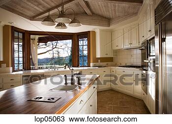 Stock Photo - large country 
style kitchen. 
fotosearch - search 
stock photos, 
pictures, images, 
and photo clipart
